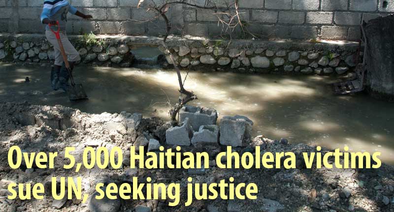 Haitian worker draining swamp